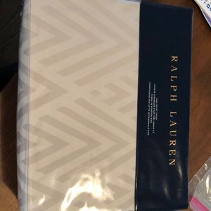 Brand new never opened Ralph Lauren king duvet. Never opened or used!